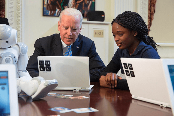 Vice President Joe Biden with a student during the Hour of Code event